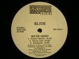 SLIDE / WE’RE HERE!